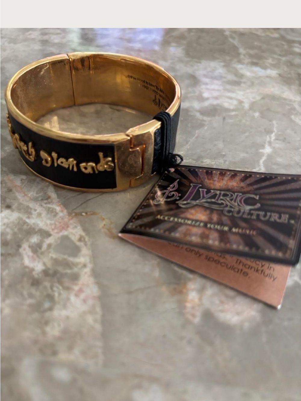 **NWT**Lyric Culture The Beatles Lucy in the Sky with Diamonds bangle black/gold